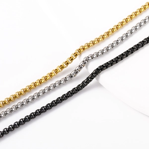 Detailed macro view of square box chains in gold, silver, and black stainless steel colors