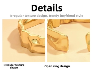 Detail of gold stainless steel ring with irregular hammered texture and adjustable opening