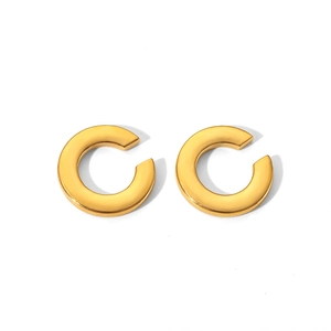Detailed view of dual 18K gold-plated stainless steel C-shaped ear cuffs on white background