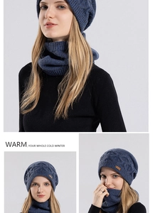 Detail of cable knit beanie and neck warmer set in dark denim blue with fleece lining