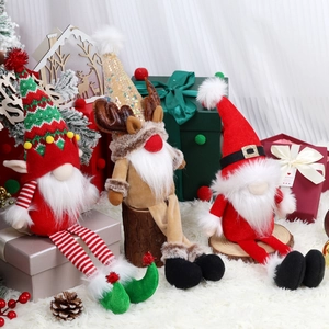 Three-piece Christmas gnome set with reindeer and Santa styles on a cozy winter backdrop