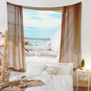 Detail showing the ocean view landscape tapestry with warm brown curtains and blue sea