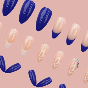 Blue almond press-on nails set with French tips, star patterns and rhinestones