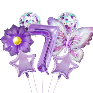 Detail of purple birthday balloon set with number 7 butterfly and sequin balloons