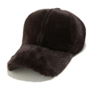 Close-up of deep brown faux fur plush baseball cap showing rich texture and glossy fibers