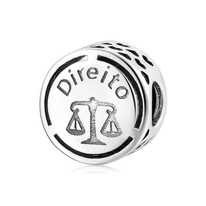 S925 sterling silver hollow charm with Direito engraving and heart cutouts on white background