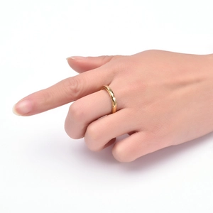 Macro shot of 18K gold plated stainless steel ring featuring geometric faceted diamond patterns