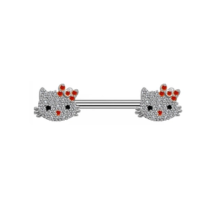 Close-up of barbell nipple rings featuring Hello Kitty heads with sparkling rhinestones