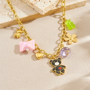 Gold plated stainless steel necklace featuring colorful bear, heart and candy charms