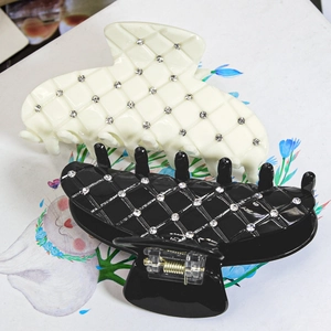 Elegant checkered hair claw clips with rhinestones in black and white colors
