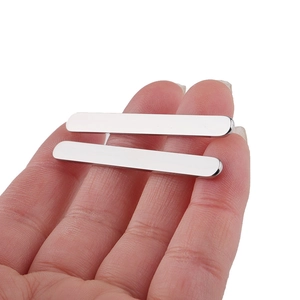 Macro view of two 5mm polished silver stainless steel blank strips for DIY rings