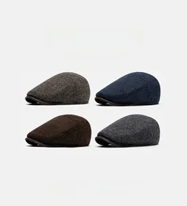 Detailed grid view of tweed flat caps in brown, navy, coffee and gray colors