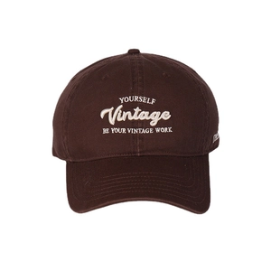 Dark brown cotton baseball cap with vintage white embroidery and soft curved brim