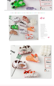 Detailed shot of animal-shaped acetate hair claws including cats and frogs with glossy finish