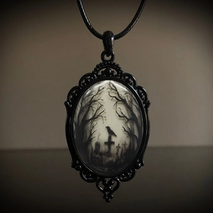 Gothic raven crow on gravestone necklace with black rope chain and glass pendant