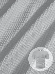 Detailed macro view of the grey waffle knit fabric texture on a men's casual t-shirt