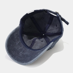 Washed dark grey denim baseball cap with vintage distressed finish and adjustable buckle