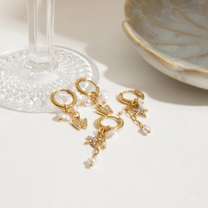 Boucles d'oreilles papillon et perle en acier inoxydable plaqué or 18 carats de luxe