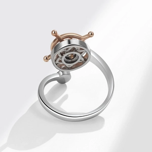 Rotating ship wheel spinner ring for anxiety relief in silver and rose gold finish