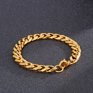 Detailed view of gold plated cuban link bracelet with secure lobster clasp closure