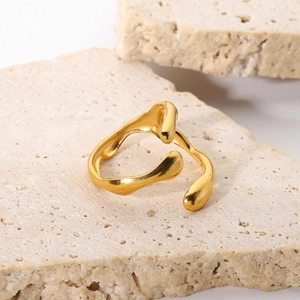 Irregular wave design 18K gold plated stainless steel open ring on a stone base