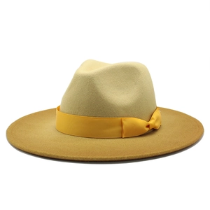 Two-tone wool felt fedora with yellow crown, brown wide brim and satin ribbon detail