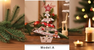 Detail of wooden Christmas tree tabletop decoration with layered ornaments and a red star