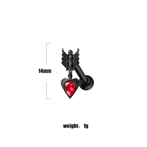 Detail showing 14mm bat heart belly button ring with red gem and black finish