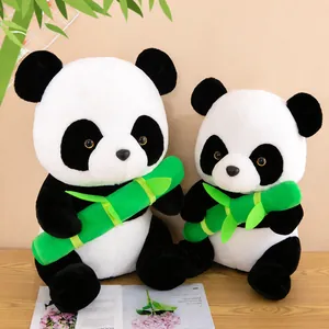Adorable giant panda plush toys holding green bamboo, soft stuffed animals for gifts