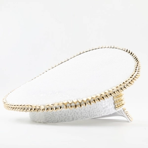 Sparkly white sequin captain hat with gold studded spikes for festivals and parties
