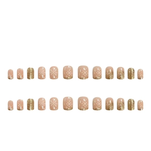 Winter-Kunstnägel mit Schneeflocken, Nude-Rosa und goldenem Glitzer-Farbverlauf