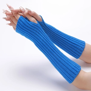 Detail view of bright blue knitted long arm warmers with ribbed texture and thumb hole