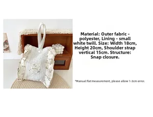 Detail view of floral quilted handbag showing 18x20cm dimensions and snap closure