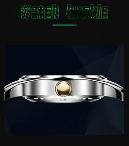 Close-up of silver brushed metal case and golden serrated crown on a quartz watch