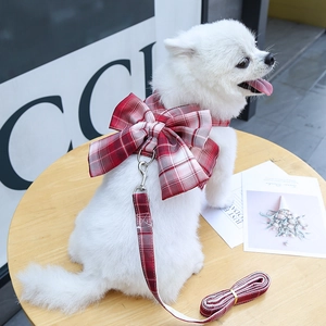 Red plaid dog harness vest with large bow tie and matching leash set for small pets
