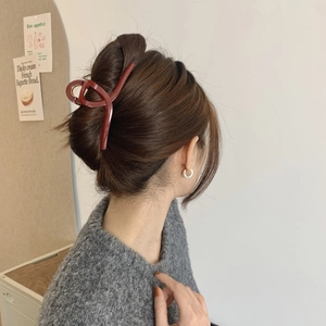 Elegant wine red large hair claw clip for women with a glossy resin finish and sturdy grip