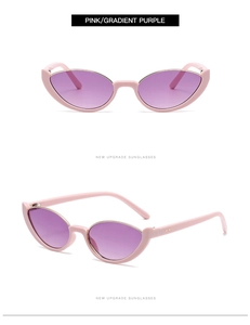 Detail view of pink cat-eye semi-rimless sunglasses with gradient purple lenses