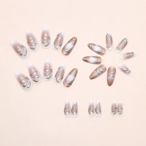 Detail of almond-shaped press-on nails with silver 3D metallic lines and cat-eye gradient