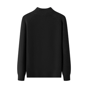Rear view of a black knitted sweater with a turtleneck and raglan sleeve design