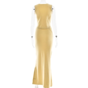 Detail of light yellow knit two-piece set showing sleeveless top and long skirt texture