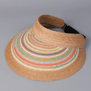 Detailed weave texture of raffia sun visor featuring vibrant colorful stripe trim
