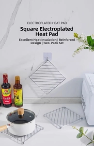 Kitchen heat resistant pad made of polished chrome metal in a sturdy square wire design