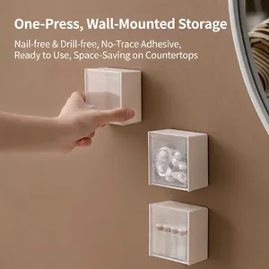 Three-piece wall-mounted storage boxes with transparent lids for bathroom organization