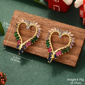 Detail showing heart earrings size 2.8cm by 2.2cm with colorful cubic zirconia stones