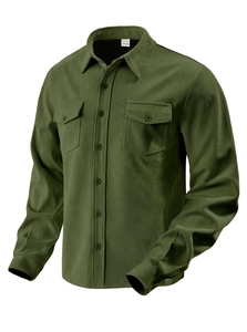 Detail of olive green corduroy shirt featuring buttoned chest pockets and collar