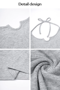 Detail design of grey ribbed knit top showing neck notch, lace-up back and hem finish