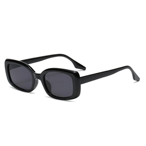 Classic black oval sunglasses with thick frames shown from a 45-degree side angle