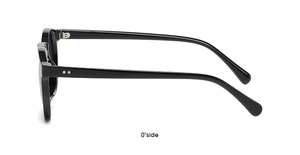 Side view detail of black round sunglasses featuring silver decorative metal rivets