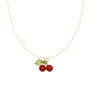 Elegant gold cherry necklace with red carnelian beads and green leaf on white background