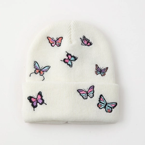 White knit beanie with colorful butterfly embroidery for women's winter fashion
